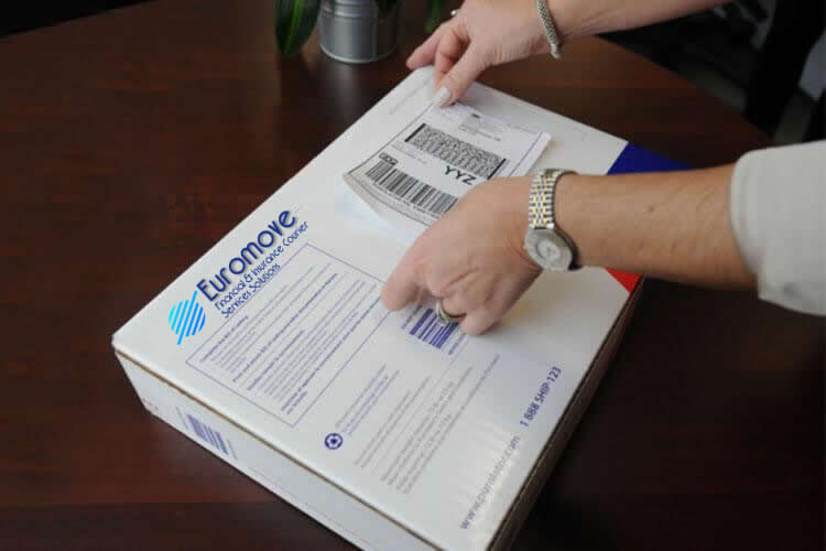 Applying Euromove label to box